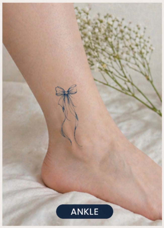 Alter Ego Ink ribbon bow temporary tattoo — dreamy fine line flowing design