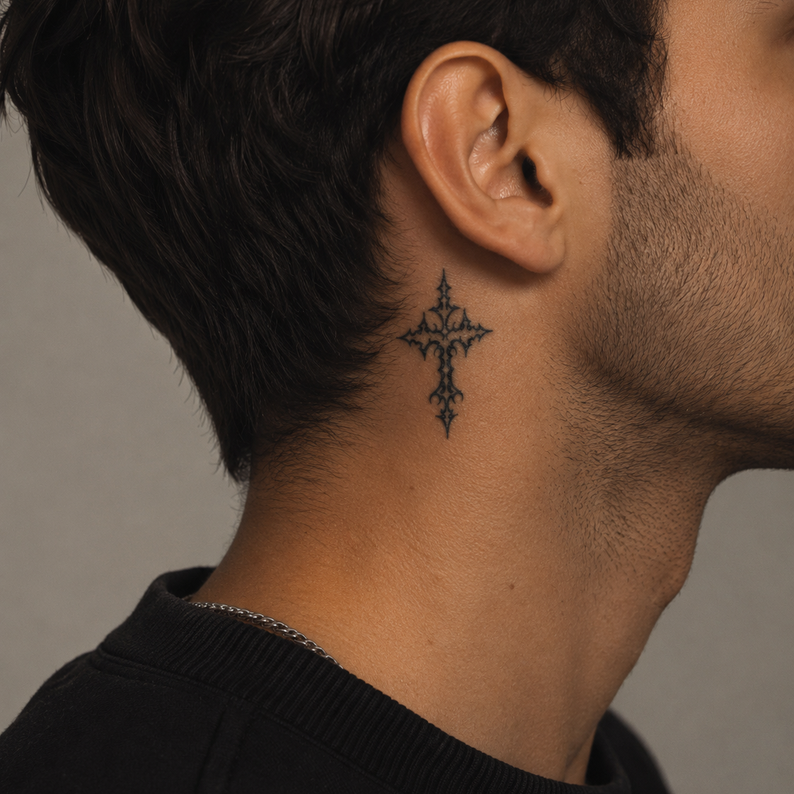 Gothic cross temporary tattoo on man's neck, semi permanent fine line religious tattoo, real tattoo look by Alter Ego Ink