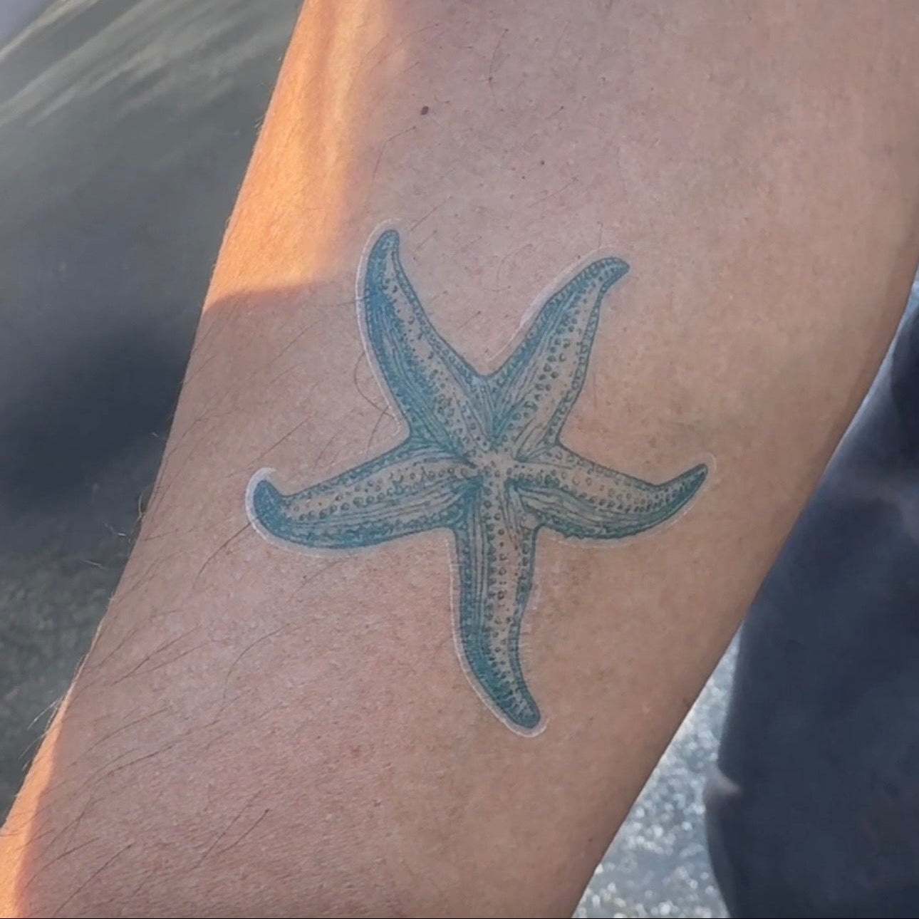 Sea Whisper temporary tattoo lifestyle photo — Alter Ego Ink waterproof ocean starfish tattoo