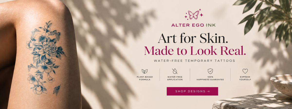 Alter Ego Ink water-free temporary tattoo featuring a realistic blue floral tattoo on the thigh.