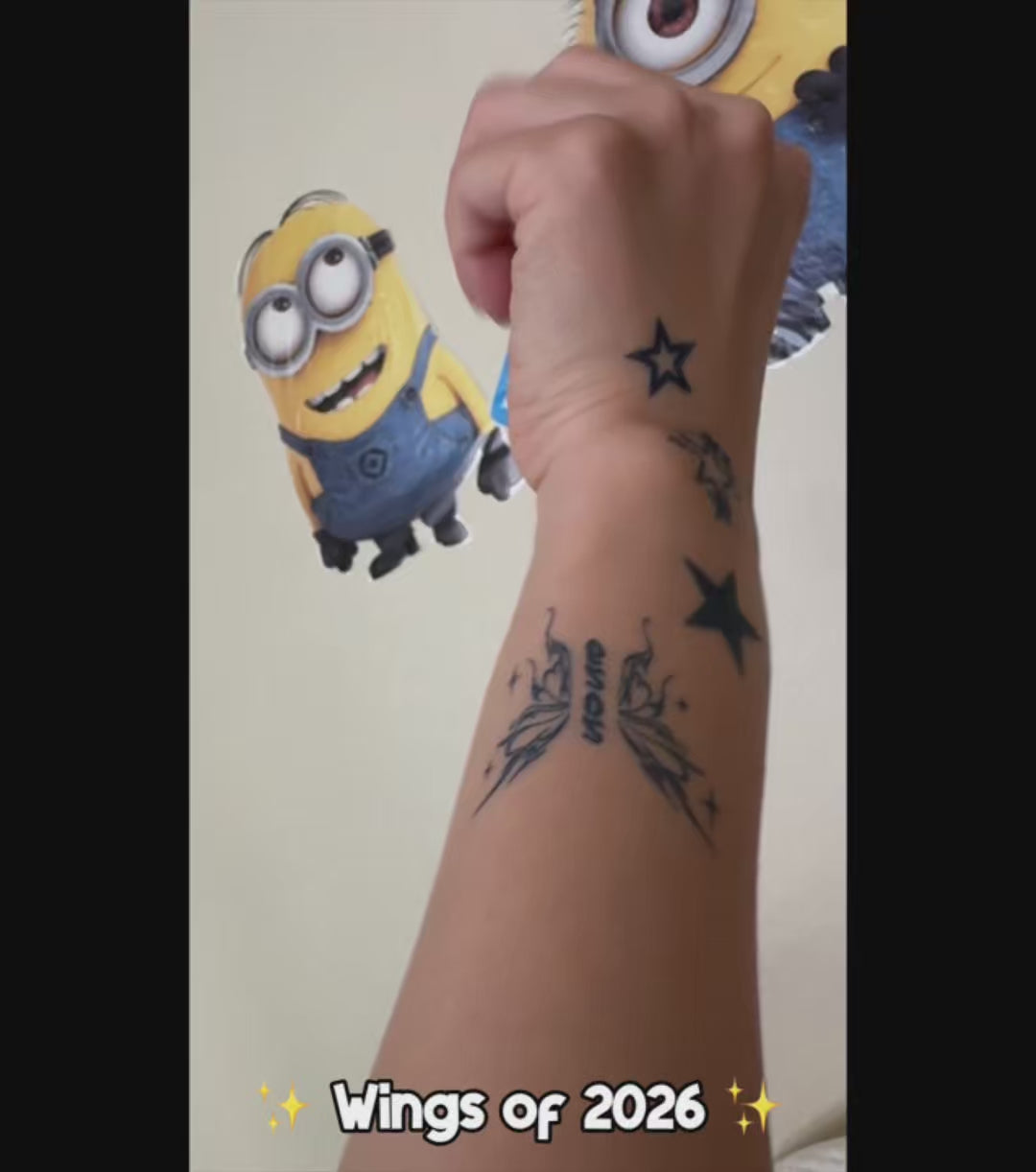 Real tattoo look temporary tattoo featuring butterfly wings and the year 2026. Graduation-themed design for the Class of 2026, symbolizing new beginnings, achievement, and the journey ahead.