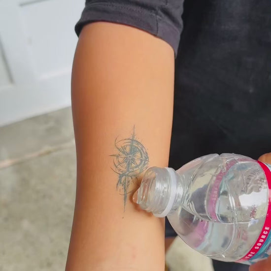 Celestial Compass temporary tattoo waterproof wear test on skin — Alter Ego Ink fine line compass design