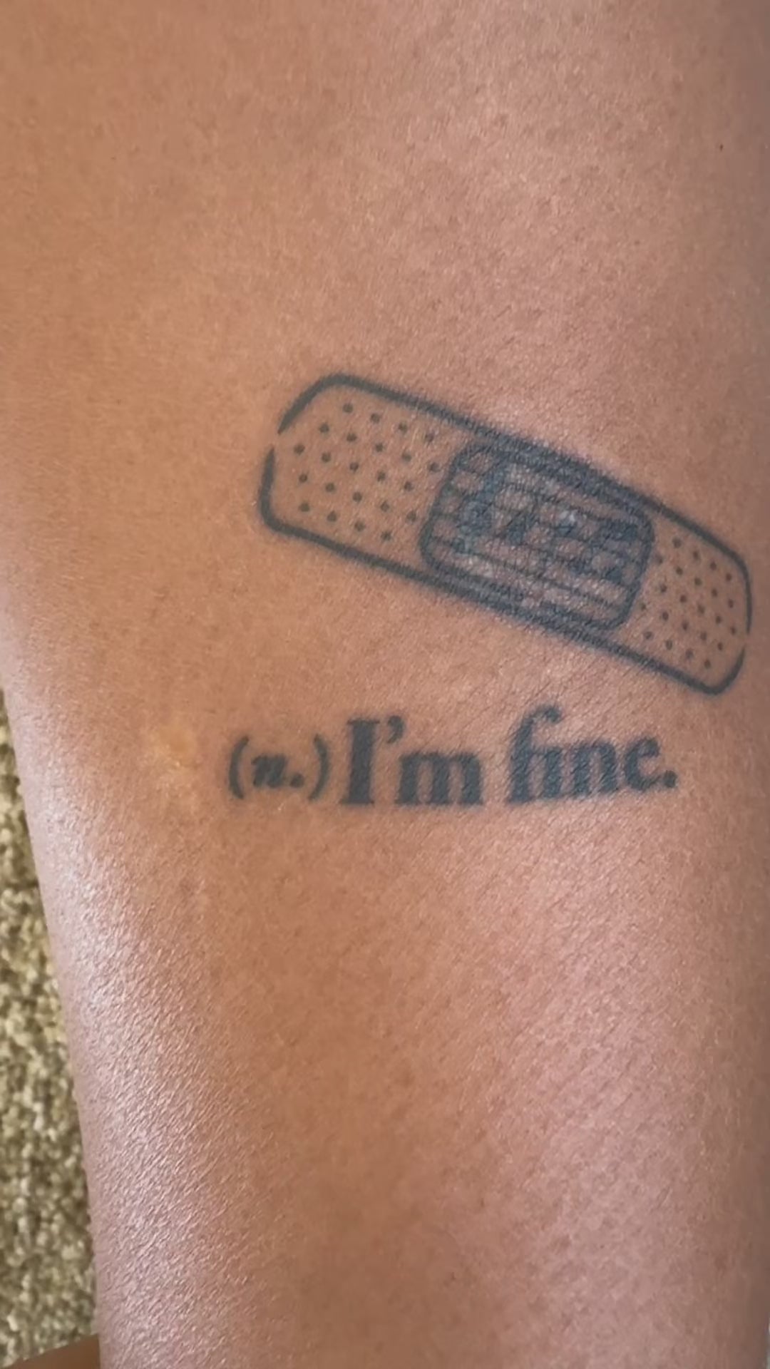 Before and after showing the I'm Fine bandage temporary tattoo transforming a scar into wearable art