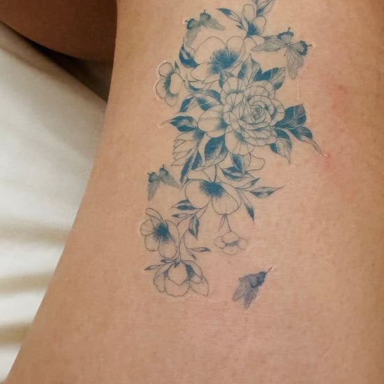 the Secret Garden realistic temporary tattoo, showcasing a waterproof fine-line floral tattoo design after swimming